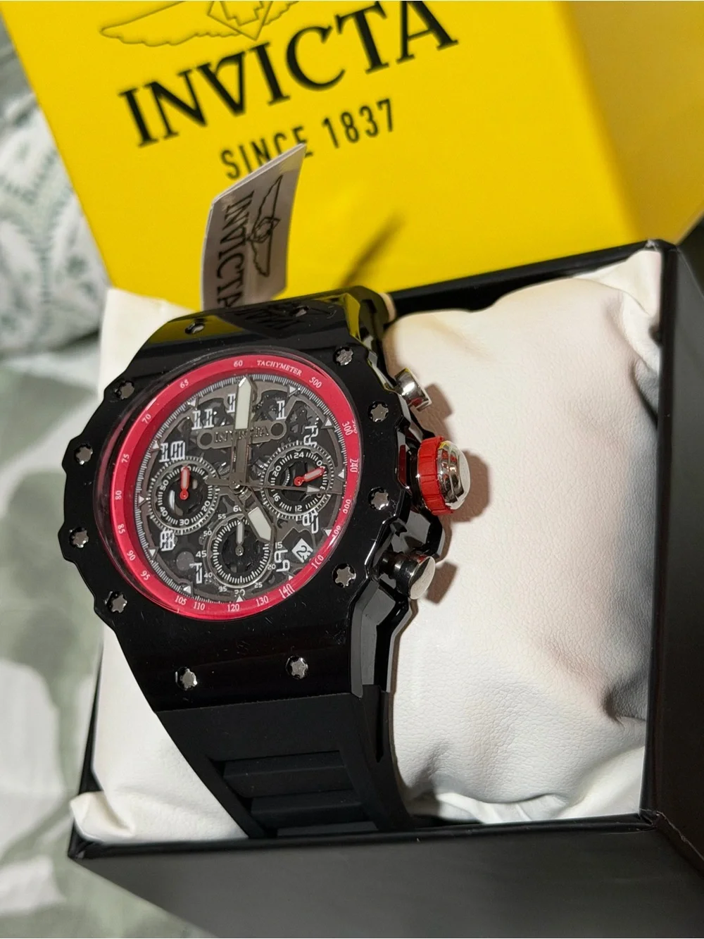 Invicta Racing Black Watch with Red Accents and Skeleton Dial